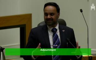 Tanzil Rahman giving a speech